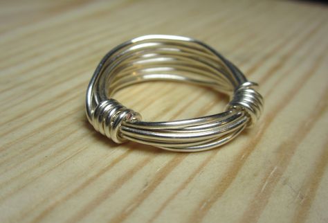 Boho mens wire wrapped ring. https://www.etsy.com/listing/156292687/hippie-ring-boho-rings-mens-ring-size-10? Mens Wire Rings Diy, Wire Rings For Men, Diy Boho Rings, Diy Wire Rings, Hippie Ring, Ring Boy, Rings Mens, Wrapped Rings, Mens Jewellery