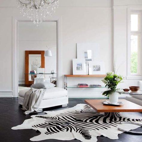 Zebra Cowhide Rug, Zebra Animal Print on Cowhide Rug Zebra Cowhide Rug, Black Laminate Flooring, Interior Design Examples, Zebra Rug, White Cowhide Rug, Minimal Interior Design, Classic Living Room, Cowhide Rug, Minimalism Interior