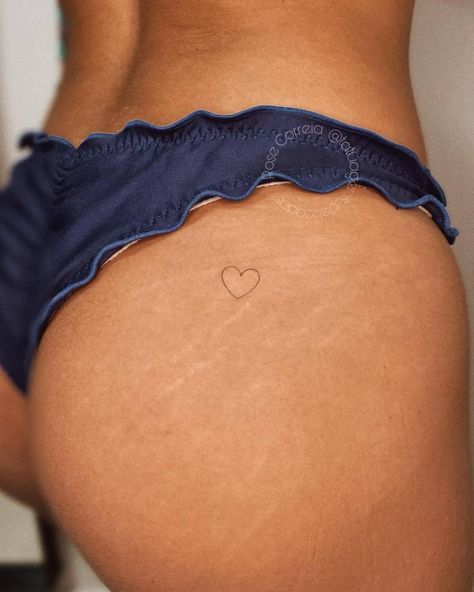 Red Heart On Buttcheek Tattoo, Heart Tattoo On Buttocks, Small Red Heart Tattoo On Buttcheek, Mom Heart Tattoo Simple, Red Heart Tattoo On Bum Cheek, Red Heart Tattoo On Hip, Little Heart Tattoos For Women, Tattoos On Buttcheek For Women, Cheek Tattoo For Women