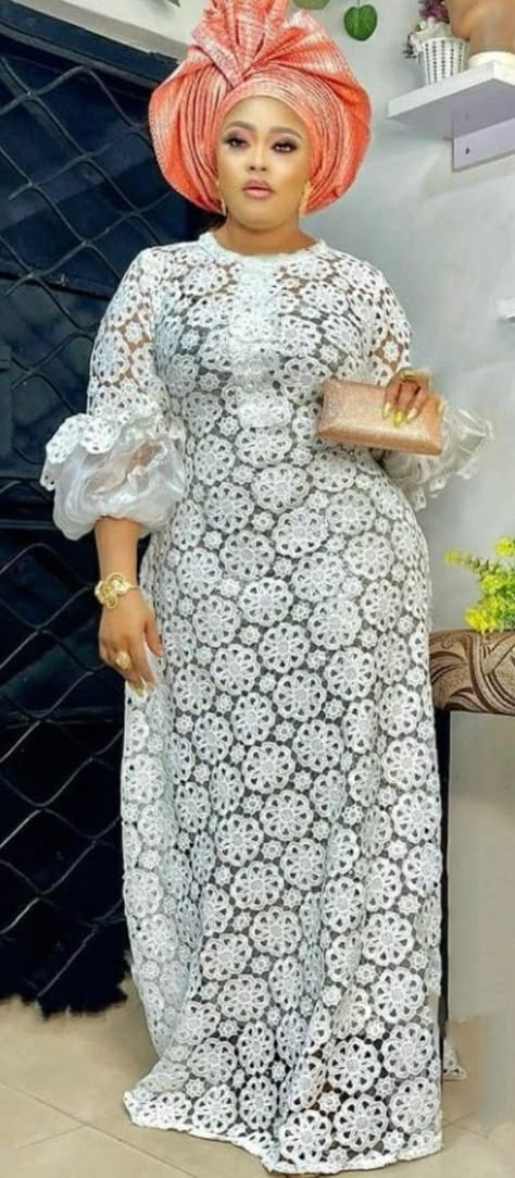 Pin by Tale Aro on Quick saves in 2022 | African lace styles, Lace dress styles, White lace outfit Nigerian White Lace Long Gown Styles, African White Lace Dress Styles Long, African Lace Dresses Nigerian Fashion Classy, White Lace Gown Styles Nigerian, White Lace Dress Styles Nigerian, Cord Lace Gown Styles, Lace Dress Styles Nigerian, Lace Gown Styles Nigerian, Nigerian Lace Dress