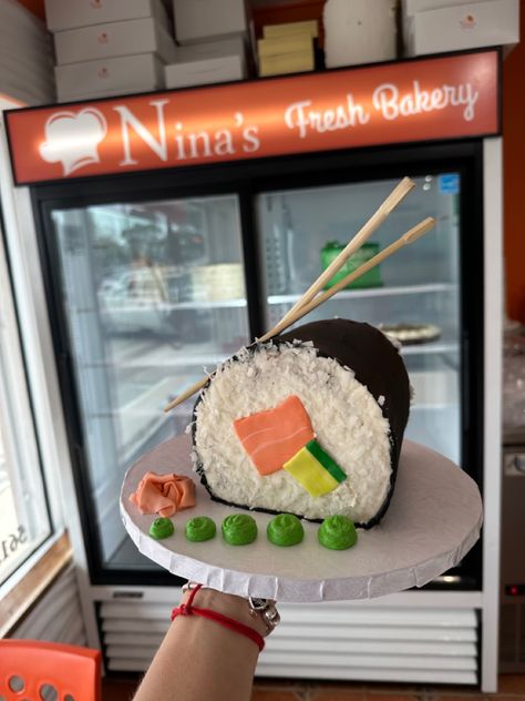 Sushi roll cake Sushi Shaped Cake, Sushi Roll Cake, Surprise Sushi, Sushi Torte, Sushi Cake Birthday, Unusual Cake, Ninth Birthday, Sushi Cake, Graduation Party Cake