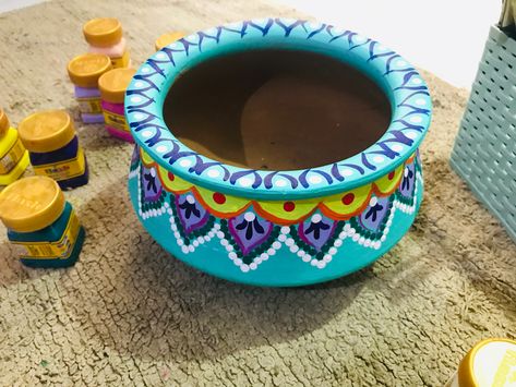 Recycling of biryani handi for beautiful plants Handi Pot Painting, Matka Pot Painting Ideas, Biryani Pot Painting, Biryani Pot Painting Ideas, Handi Decoration Ideas, Handi Decorations, Earthen Pot Painting Ideas, Matka Decoration Pots Painting, Pot Designs Painted Indian