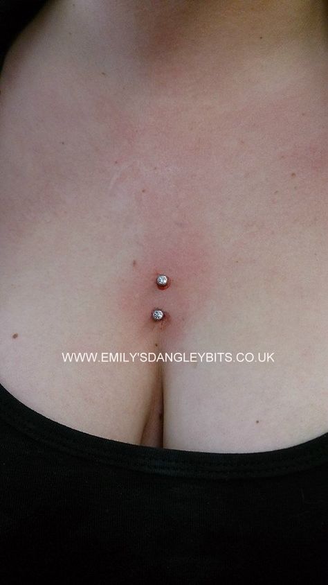 Cleavage Skin Piercing Middle Chest Piercing, Surface Piercing Chest, Piercing Dos, Dermal Piercing Chest, Collar Bone Piercing, Chest Piercing, Skin Piercing, Surface Piercing, Pretty Tattoos For Women