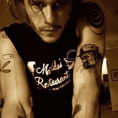 Heath Ledger tattoos S Tattoos, Heath Ledger, Shoulder Tattoo, A Man, Long Hair, Tattoos, Hair, Shoulder Tattoos