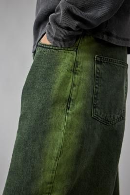 Relaxed wide fit jeans by BDG. Features a heritage denim design in a tinted wash. Cut with a regular rise waist, belt loops, button and zip fastening and a classic five-pocket fit. Only at UO. **Content + Care** \- 100% Cotton \- Machine wash **Size + Fit** \- Model is 188.5cm/6'0" and wearing size 32W 32L | BDG Overdyed Green Jack Jeans - Green 30W 30L at Urban Outfitters Overdyed Jeans, Wide Fit Jeans, Green Jeans, Denim Design, Waist Belt, Denim Wash, Fit Jeans, Jeans Fit, Urban Outfitters