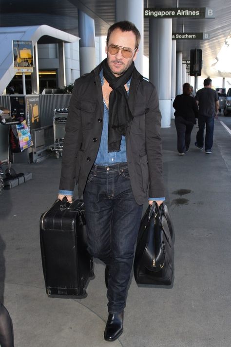 LOS ANGELES, CA - FEBRUARY 23: Tom Ford seen at LAX on February 23, 2015 in Los Angeles, California. (Photo by GVK/Bauer-Griffin/GC Images) Tom Ford Menswear, Tom Ford Designer, Best Dressed Man, How To Wear A Scarf, Tom Ford Men, Gq Magazine, How To Wear Scarves, Perfect Man, Stylish Men