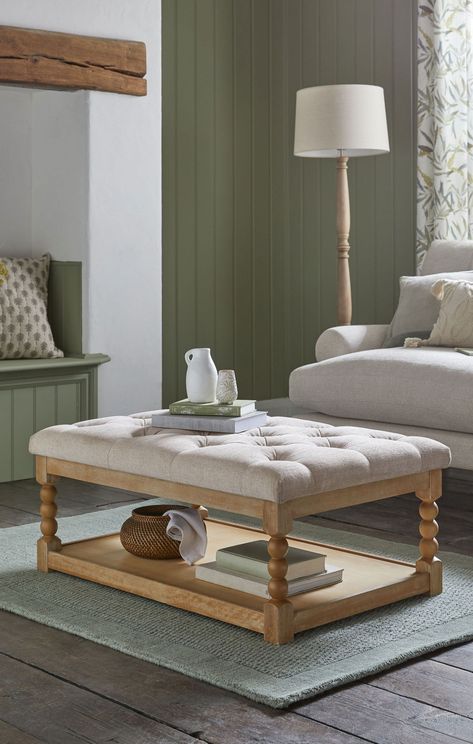 This Lancaster Footstool is a great addition to your home. Doubling up as a coffee table this stool can be decorated beautifully as well as used for its great storage shelf which has been designed to fit the average-sized storage basket. With the stylish bobble legs and deep plush buttoning, this will be a feature in your home. This stool is a...#Your #HomeDecor #for #Inspiring #a #Space #Stylish #Ideas #Room #and #Inviting #Elevate #InteriorDesign #Living #DecorInspiration #Living #DecorTips Coffee Table Footstool, Pouffe Coffee Table, Footstools Ideas Living Room, Coffee Table Cottage, Coffee Table Traditional, Modern Rustic Coffee Table, Cottage Sitting Room, Soft Coffee Table, Coffee Table Pouffe