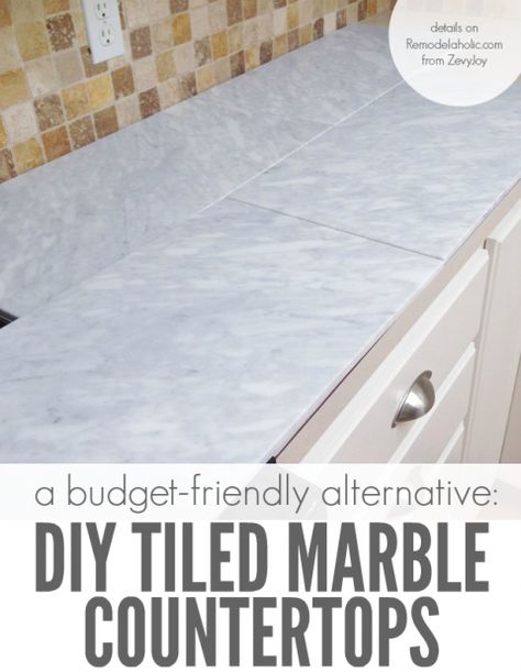 Beautiful! Self-installed tile marble countertops are a cheaper alternative to slab marble counters, so you can get the same beautiful look for a LOT less money @Remodelaholic Tile Bar Top Ideas, Replace Tile Countertop, 1800 Kitchen, Diy Marble Countertops, Tile Countertops Diy, Inexpensive Kitchen Countertops, Kitchen Countertop Decor Ideas, Countertop Decor Ideas, Carrera Marble Countertops