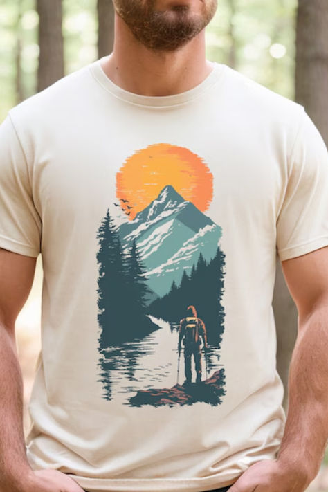 Image of a mountain forest hiking t-shirt, perfect for outdoor lovers. This graphic tee features bold woodland designs ideal for camping and nature adventures. Showcasing earthy tones and vibrant prints, the shirt appeals to hikers and anyone who appreciates outdoor gear. Forest Hiking, Camping Shirts, Nature Tees, Hiking Tshirt, Mountain Forest, Mountain Tshirt, Outdoor Gifts, Nature Shirts, Outdoor Enthusiast