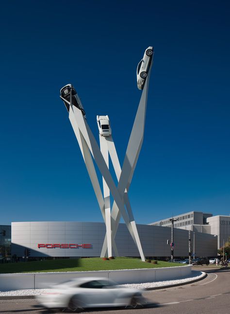 Three sports cars appear to soar up into the sky outside auto brand Porsche's museum in Stuttgart as part of this sculpture by British artist and designer Gerry Judah. Gerry Judah, Porsche Museum, Ferdinand Porsche, Stuttgart Germany, Magic Garden, Car Museum, Porsche Design, Sculpture Installation, Land Art