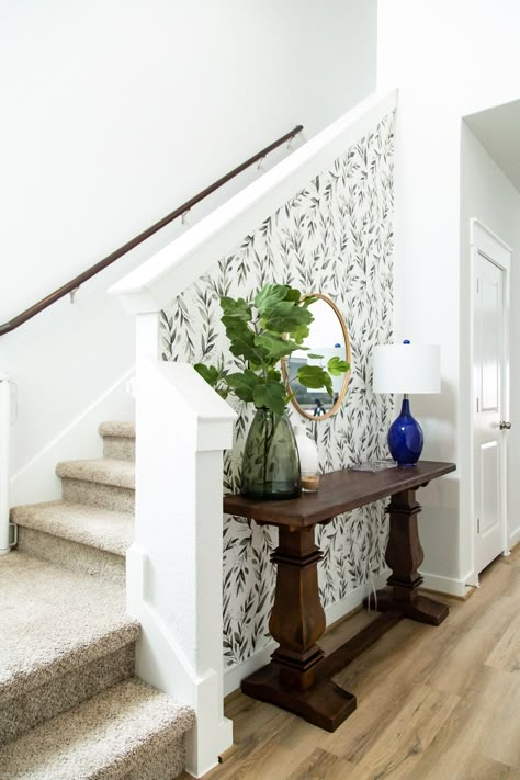 This gorgeous DIY entryway makeover was done using only items found at homedepot.com/decor! Tons of ideas for how to make your small entry feel welcoming and beautiful. #HomeDepotDecor #HomeDepotPartner #sponsored Small Entry Stairs, Wall At Top Of Stairs Decor, Small Front Entryway Ideas With Stairs, Top Of Stairs Decor Upstairs Landing Interior Design, Side Of Stairs Decor Ideas Entryway, Small Entry With Stairs, Small Entryway With Stairs Ideas, Stairwell Entryway Ideas, Entryway By Stairs