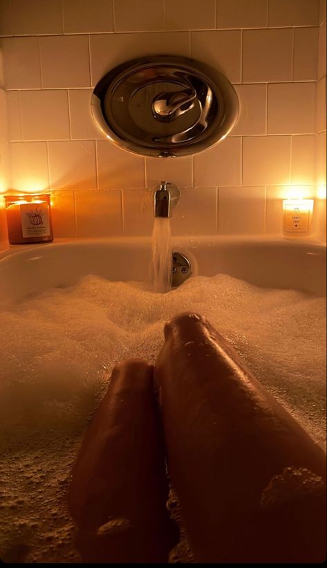 A woman’s legs in the bathtub, with bubble surrounding her candles on each side of the bath tub, water flowing while photo Bath Tub Aesthetic, Bathtub Aesthetic, Gross Things, Bath Pictures, Aesthetic Bath, Bath Aesthetic, Aesthetic Pretty, Night Routine, Bubble Bath