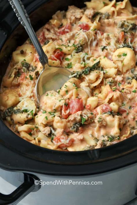 This creamy crockpot tortellini is an easy cheesy pasta dish! Made with sausage, cream cheese, and frozen tortellini it is simple to prepare and makes the most delicious supper with little effort. #spendwithpennies #creamycrockpottortellini #creamytortellini #slowcookerrecipe #crockpotrecipe #pastadish #creamypastasauce Tortellini Recipes Crockpot, Tortellini Crockpot, Pasta With Cream Cheese, Lazy Crock Pot Lasagna, Crock Pot Pasta, Easy Cheesy Pasta, Frozen Tortellini, Crockpot Tortellini, Crock Pot Tortellini