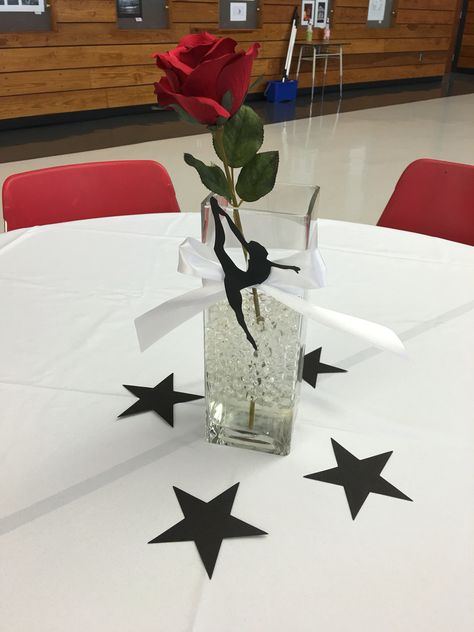 Dance team banquet centerpiece Dance Team Table Decorations, Team Banquet Centerpieces, Awards Banquet Decorations, Dance Banquet Centerpieces, Dance Team Banquet Ideas, Gymnastics Banquet Ideas, Dance Banquet Ideas, Team Banquet Ideas, Cheer Banquet Ideas Table Centerpieces