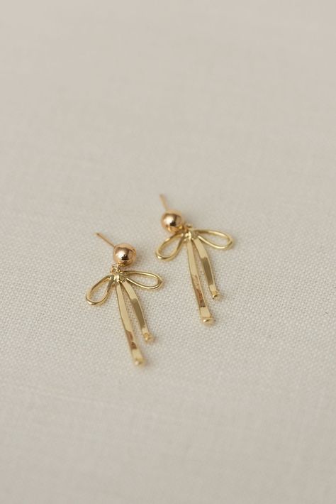 Dangly Bow Earrings | Luna & Jade – Luna & Jade Delicate Earrings Gold, It Girl Earrings, Dainty Jewelry Earrings, Gold Dangly Earrings, Bow Earrings Gold, Silver Charm Earrings, Gold Bow Earrings, Fancy Gold Earrings, Gold Simple Earrings