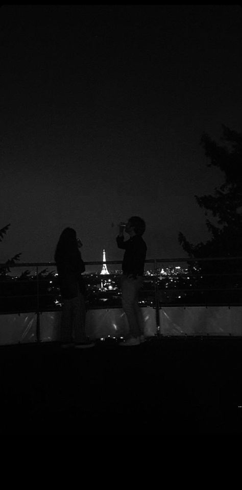 two people having a couple of drink on a rooftop with the view to the Eiffel Tower Couples On Rooftop At Night, Talking Couple Aesthetic, Couple On Rooftop Aesthetic, Rooftop Date Night Aesthetic, Couple On Balcony Night, Balcony Aesthetic Night Couple, Rooftop Couple Aesthetic, Rooftop Aesthetic Night Couple, Rooftop View Night Aesthetic