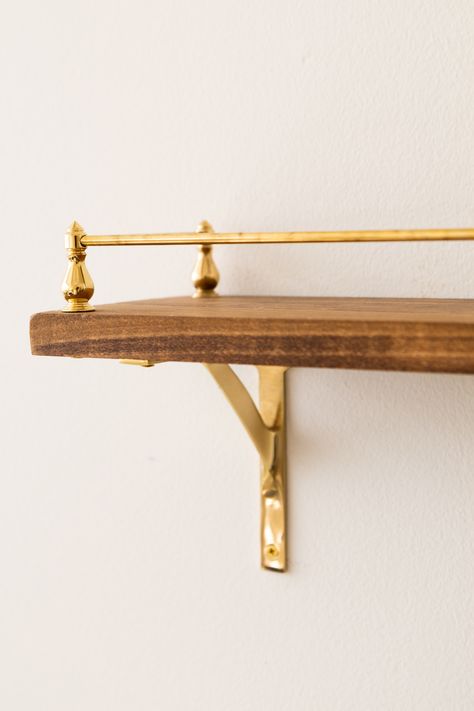 Kitchen Shelves Brass Brackets, Wall Shelf With Gold Brackets, Brass Shelf Brackets Kitchen, Brass Kitchen Shelf, Shelf With Brass Brackets, Vintage Shelf Brackets, Shelf Guard Rail, Floating Shelves Brass Rail, Gold Brackets For Shelves