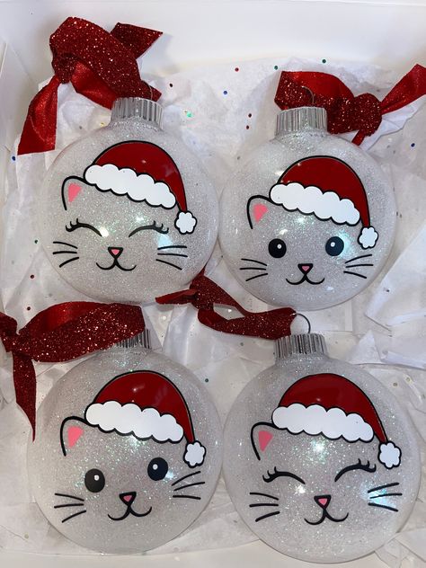 a set of 4 ornaments for my cat lovers out there !  Each includes 4 plastic ornaments designed with permanent vinyl!  Also includes a matching gift box! -SALES ARE FINAL Cat Xmas Ornaments, Cat Diy Ornament, Cricut Vinyl Ornaments, Christmas Glass Ornaments Diy Ideas, Christmas Fillable Ornaments, Christmas Ornaments To Make With Cricut, Diy Ornaments Dollar Tree, Cat Ornaments Diy Homemade Christmas, Pet Christmas Ornaments Diy