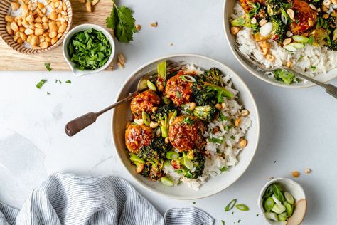 Sweet & Spicy Sesame Chicken Meatball Bowls | Ambitious Kitchen Sesame Chicken Meatballs, Chicken Meatball Bowls, Spicy Sesame Chicken, Meatball Bowls, Crispy Broccoli, Meatballs Chicken, Yummy Noodles, Chicken Meatball, Sweet And Spicy Sauce