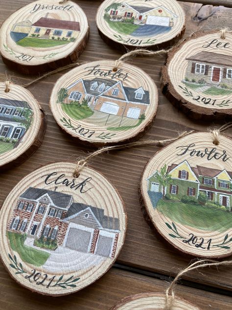 Custom painting of a home on a 3.25-4inch diameter wood slice ornament. I will write above and below the house the words of your choosing as long as there is enough space for all of them. Great gift for New home owners. People absolutely love receiving these as gifts. It's a personal gift that can't be bought just anywhere.  **Don't forget to send me an image of the front of the house as you want it painted. If there are any details you don't want missed, be sure to note that. Coloring can be slightly off in photos, so If there's any color that may be questionable (ie. The siding looks grayish but is actually green) note that as well! Thanks so much, and I look forward to painting your house on a unique wood slice! If you need a large number of them, message me as well as I don't keep a la Painted House Ornaments, New House Ornament Diy, Our First Home Ornament, New Home Christmas Ornament, Wood Painted Ornaments, First House Ornament, Painted Wooden Ornaments, Painted House, New Home Owner