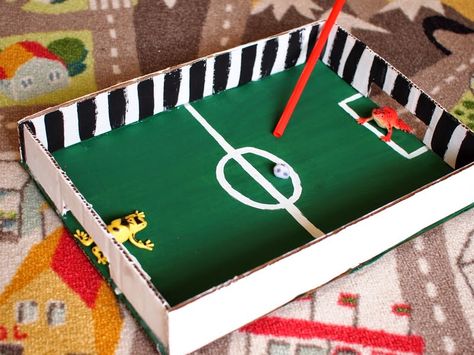 pom pom soccer game by Pink Stripey Socks Cardboard Challenge, Soccer Crafts, Soccer Games For Kids, Diy Carnival Games, Cardboard Projects, Homemade Carnival Games, Carnival Games For Kids, Football Crafts, January Calendar