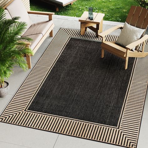 Those who thought stunning floor enhancements were exclusive to indoor spaces haven't encountered our versatile indoor/outdoor area rug. This casual rug brings warmth to any setting with its elegant striped border. Outdoor Rug On Brown Flooring, Inexpensive Patio Rug Or Floor, Outdoor Patio Rugs Seating Areas, Patio Rugs Outdoor Ideas, Outdoor Rugs Patio Ideas, Outdoor Patio Rug, Grey Outdoor Furniture, Grey Patio, Indoor Outdoor Carpet