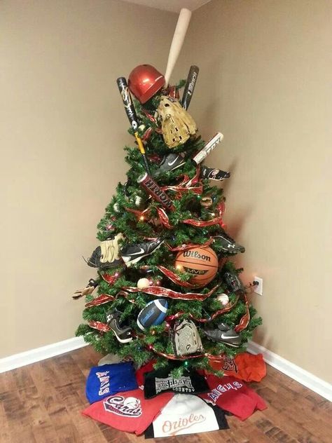 My sister used all of her boys sports equipment and decorated the cutest tree ever! I love it! Sports Christmas Decorations, Sport Themed Christmas Tree, Sports Christmas Tree Ideas, Sports Themed Christmas Tree, Sports Christmas Tree, Nba Christmas, Christmas Tree Decorating Tips, Baseball Ideas, Baseball Room