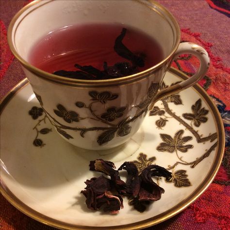 Hibiscus flower tea- a delicious and beautiful source of vitamin C- in a lovely antique tea cup. Dark Tea Aesthetic, Hibiscus Tea Aesthetic, Cup Of Tea Aesthetic, Tea Cup Aesthetic, Taryn Duarte, Tea Aesthetic, Cherry Wine, Yennefer Of Vengerberg, Antique Tea Cups