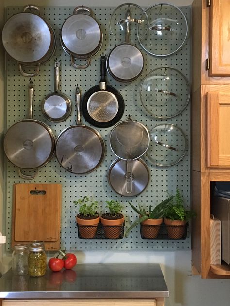 How To Hang Pans In Kitchen, Pegboard Wall Kitchen, Peg Board Plate Organizer, Cast Iron Pegboard, Peg Board Kitchen Wall, Pot And Pan Organization Wall, Peg Board Organization Kitchen, Kitchen Pan Wall, Pegboard Pots And Pans