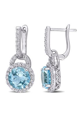 Flaunt your taste and style in these Sky Blue Topaz and White Topaz Drop Earrings. Crafted in lustrous sterling silver, these alluring earrings feature two round-cut, prong-set glowing sky blue topaz gemstones (8 x 8mm) surrounded by 60 round-cut, prong-set shimmering white topaz gemstones. Polished to a brilliant shine, these fabulous drop earrings secure with clip-in closures. Coordinate these timeless gemstone earrings with any attire and look breathtaking. | Belk & Co 5.60 Ct. T.g.w. White T Gemstone Drop Earrings, Halo Earrings, Diamond Dangle Earrings, Blue Topaz Earrings, Sterling Silver Drop Earrings, Pretty Jewelry, Sky Blue Topaz, Topaz Earrings, Sterling Silver Cuff