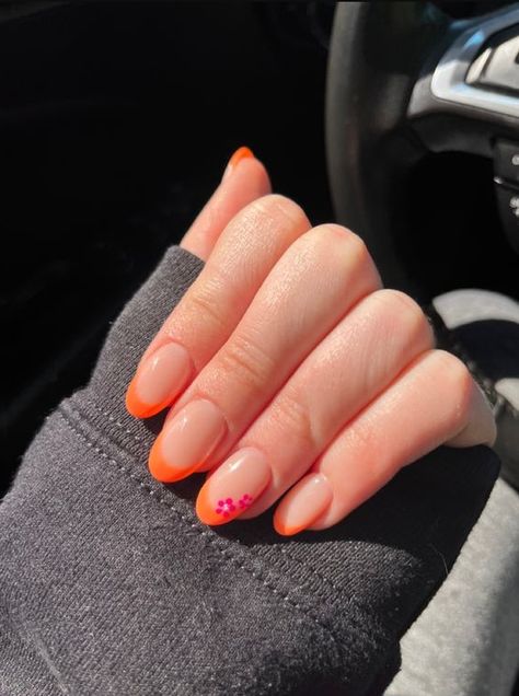 50 Stunning Spring Nails French Tip You'll Want to Copy Immediately. Orange french tip with flowers Pretty Spring Nails French Tip Ideas #springnailsideas2023 #springnailsideasacrylic #springnailsideasshort #springnailsideassimple #springnailsideasalmond #springnailsideascoffin #springnailsideassquare Pink Nails With Orange Design, Orange Tips Almond Nails, Summer French Tip Nails Orange, Cute Spring Nails French Tip, Pink And Orange Acrylic Nails Coffin, Almond Nails Designs Summer Orange, Short Acrylic Nails Orange Pink, Spring Nails 2023 Gel Orange, Simple Nail Designs Beach