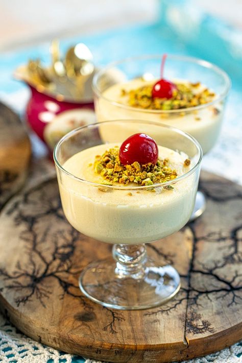 A simple but elegant and delicious dessert! Semolina Pudding Watch the Video: Greek semolina pudding is such a beautiful dessert. My creamy white pudding is topped with chopped green pistachios and a bright red maraschino Greek Pudding Desserts, Savory Pudding, Greek Dessert Recipes, Semolina Custard, Semolina Dessert Recipe, Greek Cakes, Greek Deserts, Semolina Dessert, Greek Rice Pudding