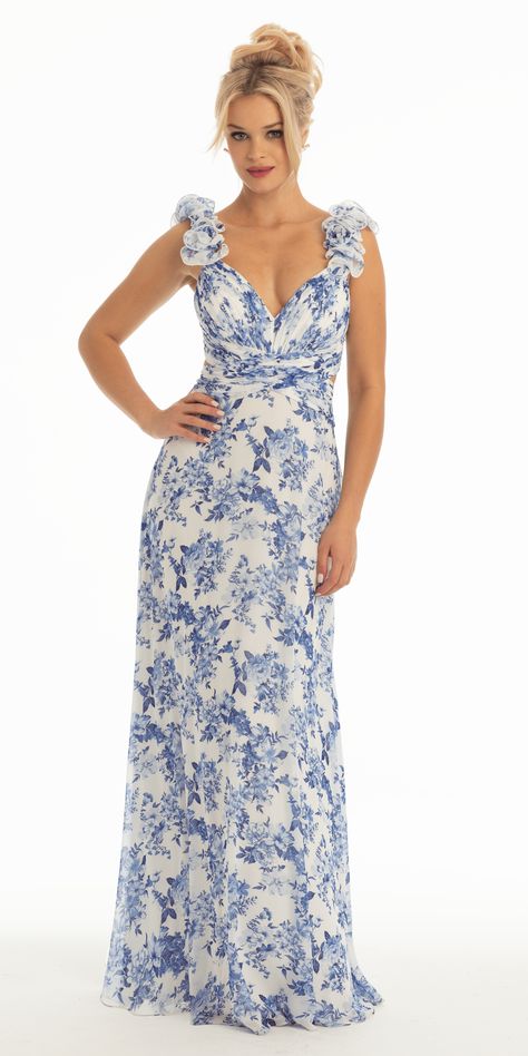 Look poised and picture perfect for your bride's special day in the Floral Print Chiffon Column Dress with Ruffle Shoulders. The features of this bridesmaid dress include a sweetheart neckline flowing from ruffle shoulder straps, fitted ruched bodice with side cut outs chiffon floral print a-line skirt and short lace up back with keyhole. Finish the radiant look with chunky platform sandals and pave drop earrings. Floral Dresses Bridesmaid, Blue And White Floral Bridesmaid Dresses, Maxi Dress With Sleeves Summer, Blue Floral Bridesmaid Dresses, Floral Maxi Dress Wedding, Gowns For Plus Size Women, Blue Floor Length Dress, Light Blue Wedding Dress, Fem Outfits