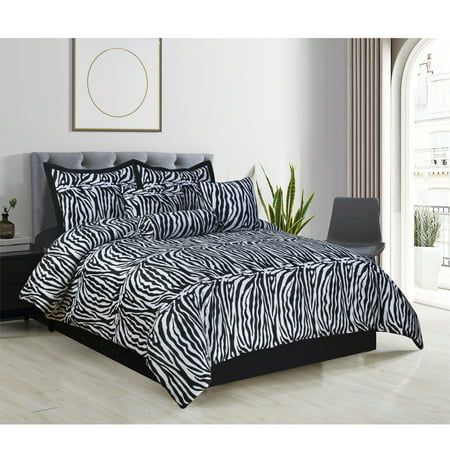 This beautiful 7 pieces ensemble will enhance the look and feel of any bedroom. The Zebra Animal print will be a vibrant addition to any bedroom. Set includes: 1 Comforter, 2 Shams, 3 decorative pillows and 1 Bed Skirt. Machine washable gentle cycle with cold water. Tumble dry low or line dry. Made of high quality faux fur fabric finish. Size: Queen.  Color: Black. Zebra Print Comforter, Zebra Print Bedding, Faux Fur Comforter, Zebra Bedroom, Twin Size Comforter, Fur Comforter, Full Size Comforter, Queen Size Comforter, King Size Comforters