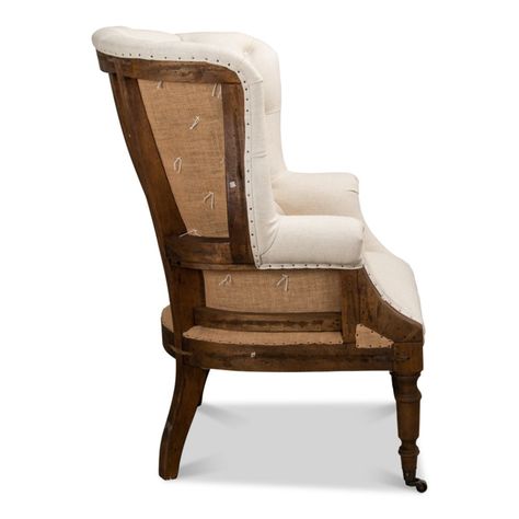 Drawing from the inspiration of a classic wingback chair and updated with a combination of tufted white linen and burlap, the Irish Chair will introduce handsome looks and texture to a space. Whether in a bedroom, living area or as office seating, this striking chair will elevate the eye appeal. deconstructed back + sides seat: 19" high arm: 27" high Deconstructed Chairs, Deconstructed Furniture, Deconstructed Chair, Restoring Furniture, Ivory Chair, Furniture Build, Bedroom With Sitting Area, Furniture Redos, Reupholster Furniture