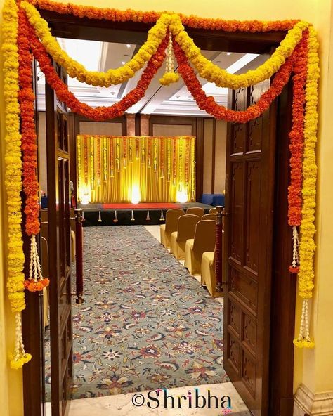 A traditional entrance decor with Marigolds! #shribha #shribhaweddings #flowersmakeitbetter #stagedecor #stagesetup #weddingplanning… Traditional Entrance, Mehendi Decor Ideas, Ganapati Decoration, Diwali Decorations At Home, Decoration For Ganpati, Housewarming Decorations, Wedding Entrance Decor, Diy Diwali Decorations, Mandap Decor