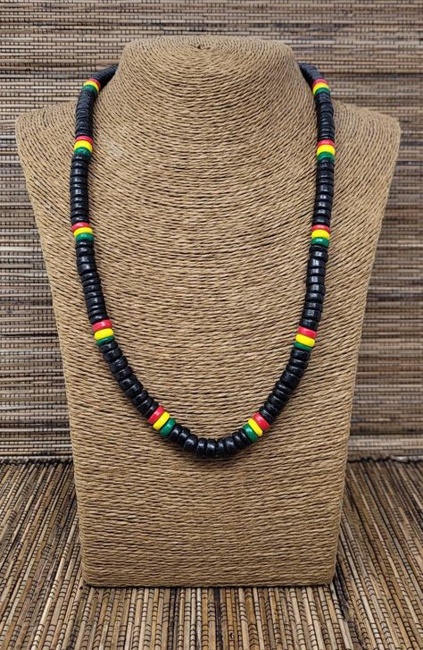 "Rasta Necklace. Wooden Necklace. Unique exotic design. Handmade with rasta color wooden beads and cord. Unisex Design. Long Necklace. 23\" Inches Around the neck FAST & FREE SHIPPING! *First Class Mail Visit my Etsy Shop to see more Designs! Handmade Rasta Wooden Earrings, Rasta Bracelets and Necklaces. Click here to see more designs: https://www.etsy.com/shop/FreedomLifeStyle" Rasta Necklace, Rasta Jewelry, Rasta Culture, Rasta Earrings, Wooden Bead Jewelry, Mens Beaded Necklaces, Rasta Colors, Necklace Wood, Wooden Necklace