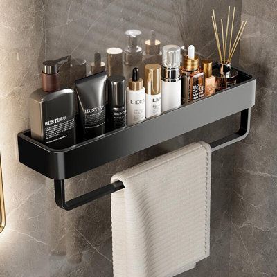 Better receive capacity upgrade r than the bathroom clean and tidy Finish: Black, Size: 3.9" H x 11.8" W x 4.9" D | Ebern Designs Taquon Metal Floating Shelf w / Towel Bar Metal in Black, Size 3.9 H x 11.8 W x 4.9 D in | Wayfair | Home Decor Black Bathroom Fixtures, Wall Decor Trends, Washroom Accessories, Metal Floating Shelves, Bathroom Counter Decor, Wall Mounted Towel Rack, Black Bathroom Accessories, Bar Metal, Bathroom Rack