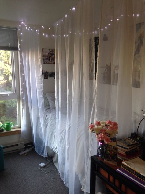 DIY dorm room canopy bed!  4 sheer curtains 3 Command ceiling hooks  String  Super cute and easy! Dorm Room Canopy, Ideas Decorar Habitacion, Teen Room Designs, Canopy Bed Diy, Canopy Bed Curtains, Canopy Curtains, Dorm Diy, Dorm Room Diy, Dorm Room Bedding