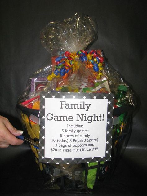 Family game night basket Game Night Gift Basket Ideas, Christmas Gift Baskets For Family, Game Night Basket, Game Night Gift Basket, Family Game Night Basket, Basket Raffle, Auction Gift Basket Ideas, Chinese Auction, Raffle Ideas