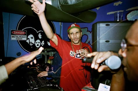 Goldie from Metalheadz mixing jungle drum and bass (dnb) music at Blue Note club in London during the 1990s. Discover more photos, flyers, posters, and newspaper clippings from 1990s rave/ club culture on our Pinterest. 1990s Rave, Club Culture, Jungle Music, Music Academy, 90s Rave, Drum N Bass, Dj Booth, Drum And Bass, Electronic Music