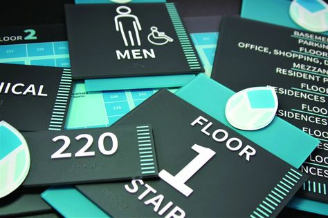 ADA-Compliant Interior Signage | GRAPHICS PRO Ada Signage, Interior Signage, Ada Signs, Pricing Calculator, Architectural Signage, Wayfinding Signs, Sign System, Interior Signs, The Americans