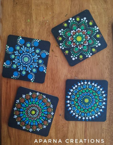 Dot mandala made using acrylic paints on wooden tea coasters from dollar store. There are time-lapse making videos of 4 coasters. Dot Mandala Coasters Easy, Mandala Coasters Diy, Mandala On Coasters, Mandala Coasters Wood, Dot Mandala Tea Coaster, Dot Mandala On Coaster, Dot Painting Coasters, Dot Art Coasters, Dot Mandala Coasters