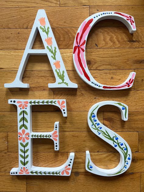 "Hand Painted Solid Wood Letters A 8\" H 7.75\" W .75\" Deep C 8\" H 6\" W .75\" Deep E 8\" H 7\" W .75\" Deep S 8\" H 75.75\" W .75\" Deep" Hobby Lobby Letters Wall Art, Letter S Drawing Art, Door Letter Decorations, Painted Letters Ideas, Wooden Letters Decorated With Paint, Painted Initials Wooden, Sorority Letters Painted Wooden Pink, Painted Sorority Paddle, Greek Letter Painting Ideas