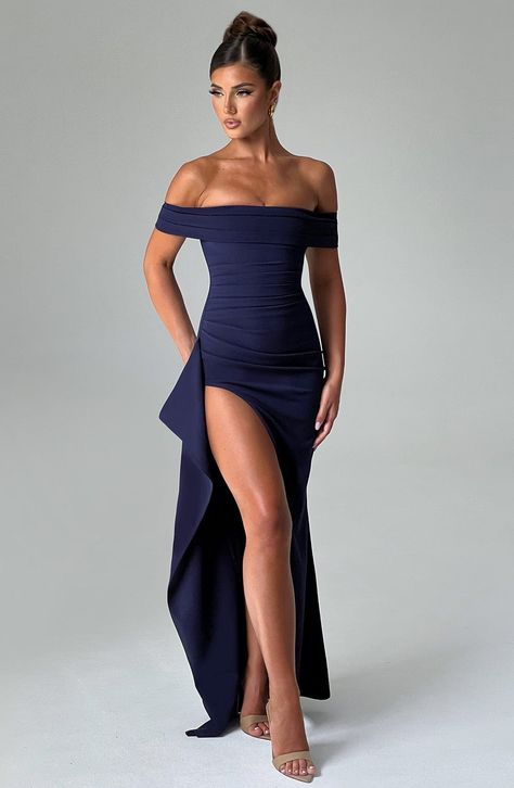 Simplicity at its most elegant in our Joyce maxi dress, cut from our luxury stretch crepe fabric. With a vintage feel, this dress sweeps over the shoulders with a pleated bardot neckline, while the bodice snatches your waist and hugs your curves to perfection with another pleat detail. We love the thigh high skirt split and elegant drape detail to the side.     Colour: Navy.  Stretch crepe fabric.  Moulds to your body.  Pleated bardot neckline.  Off the shoulder.  Draped detail thigh high split. Blue Navy Bridesmaid Dress, Low Corset Dress, Vintage Formal Outfit, Navy Dress Wedding Guest, Wedding Guest Inspo Outfit, Year 12 Formal Dresses, Singing Outfits, Navy Formal Dresses, Summer Evening Wear