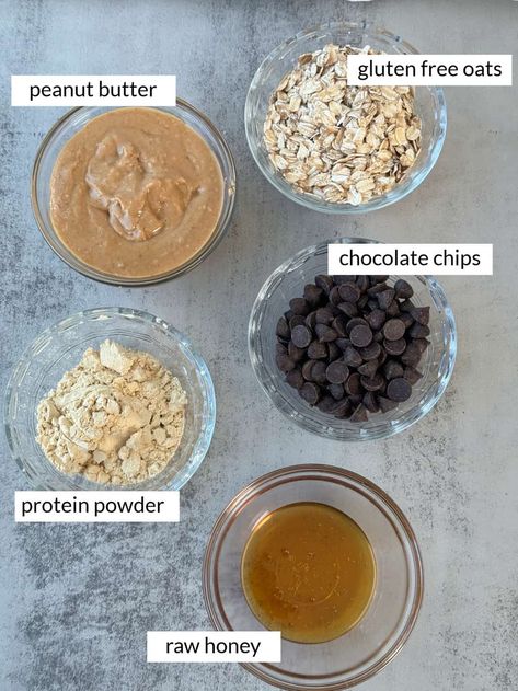 These Peanut Butter Oatmeal Protein Balls are a healthy snack. These no-bake bites are packed with protein, fiber and healthy fats, making them the perfect on-the-go energy boost. Plus, they're bursting with flavor thanks to creamy peanut butter and chocolate chips. With just a few ingredients, you can whip up a batch for a satisfying and customizable anytime snack. #peanutbutteroatmealproteinballs #peanutbutterproteinballs #homemadeproteinballs Protein Oat Bites, Protein Balls Chocolate Chip, Peanut Butter Protein Balls With Protein Powder, Protein Balls With Vanilla Protein, Pb Fit Protein Balls Energy Bites, 4 Ingredient Protein Balls, Granola Peanut Butter Balls, Pb Oatmeal Balls, Protein Balls With Peanut Butter Powder