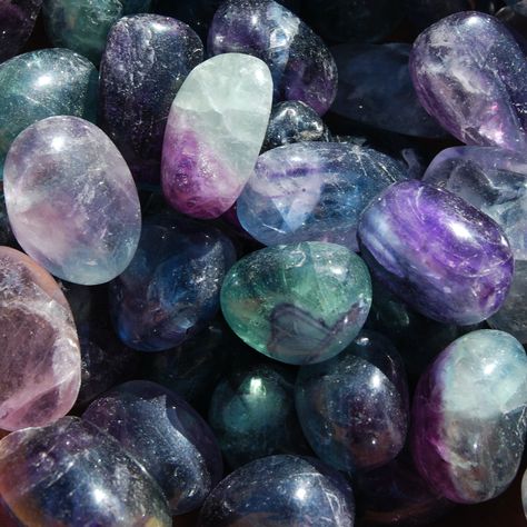 Natural medium fancy rainbow Fluorite tumbled stones. This type is full of magenta, blue and watermelon tumbled fluorite crystals. They measure approximately .75 to 1.25 inches.Fluorite is a stone of Intellect. Absorbs and neutralized stress and negative energy. Increases self confidence and concentration. It is a grounding stone that increases intuition. Cleanses the Chakras. Stimulates creativity.Chakra: Third Eye ❤︎ Follow us on Instagram to keep updated on sales and have first dibs on new pr Flourite Stone Aesthetic, Rainbow Fluorite Aesthetic, Fluorite Crystal Aesthetic, Fluorite Aesthetic, Crystals Pictures, Creativity Chakra, Pretty Crystals, Crystal Photography, Tumbled Crystals