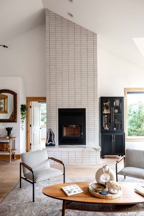 Fireplace White Tile, Modern Fireplace Brick, White Tile Fireplace Surround, Brick Tile Fireplace, White Fireplace Brick, Caitlin Shoemaker, Scandinavian Fireplace Ideas, Midcentury Fireplace, Modern Brick Fireplace