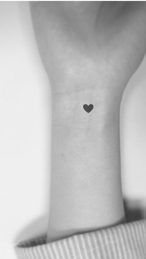 Mini Black Heart Tattoo, Minimalist Heart Tattoo Simple, Tiny Black Heart Tattoo, Heart Tattoo On Wrist Ideas, Mini Wrist Tattoos For Women, Small Black Tattoo For Women, Hart Tattoo Small, Solid Black Heart Tattoo, 3 Hearts Tattoo On Wrist