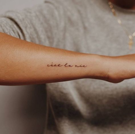 Cursive Tattoo On Wrist, Cest Le Vie Tattoo, Cest La Vie Tattoo Arm, Wrist Tattoos Writing, Side Wrist Tattoo Words, Tattoo On Side Of Arm, Side Forearm Tattoo Women Quotes, Forearm Writing Tattoo, Tattoo Ideas Writing